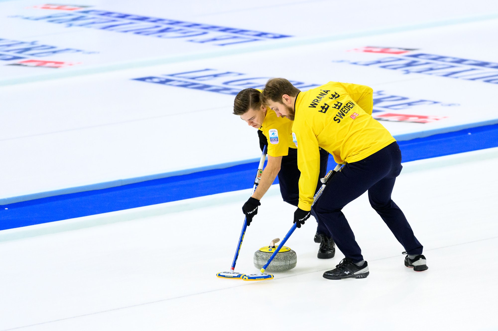 man playing curling
